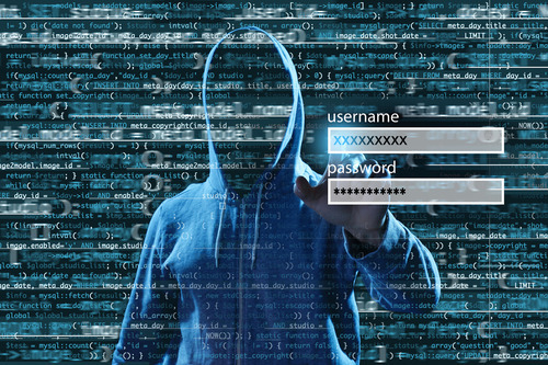 Man hacking account on virtual screen against dark background. Concept of cyber attack and security